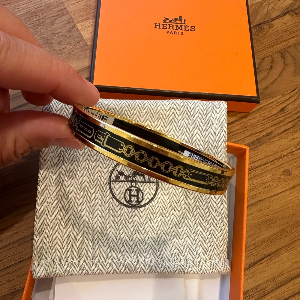 NWT Stunning black and gold Hermes Bangle